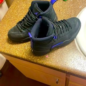 Black and purple jumpmans size 8.5 in men